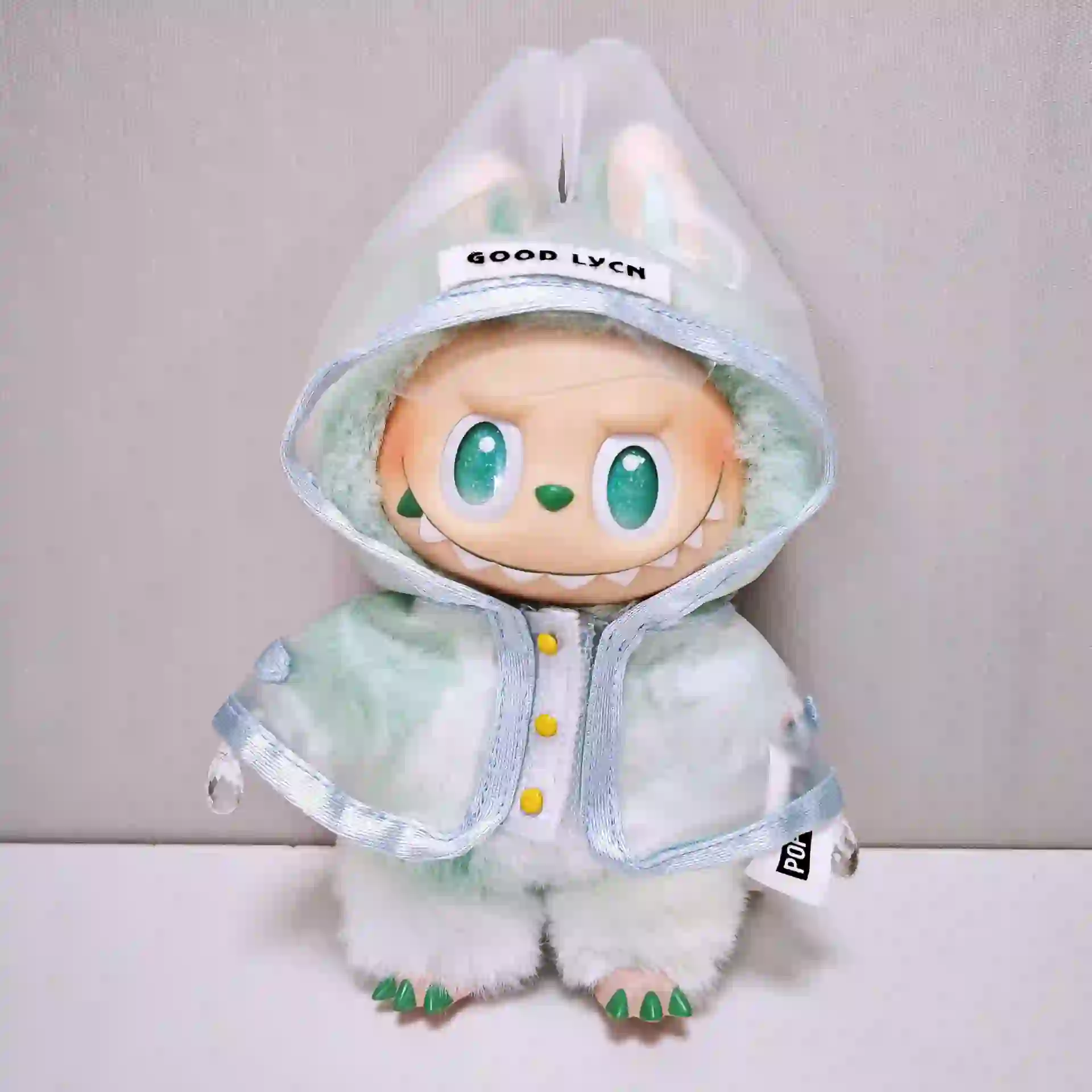 adorable labubu raincoat outfit with matching boots