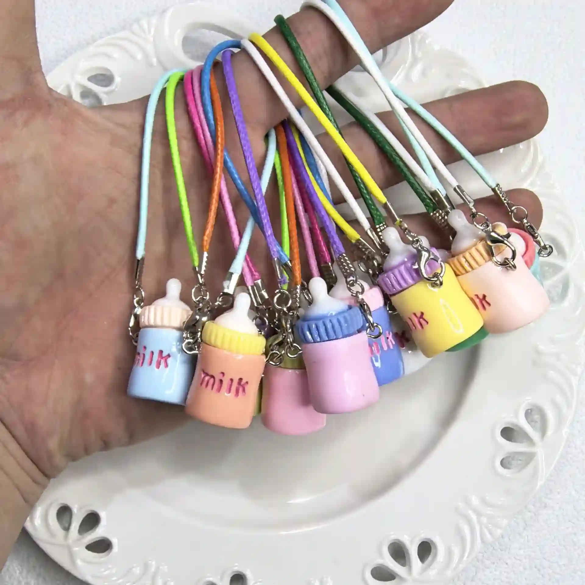 colorful pastel milk bottle keychain complements labubu doll