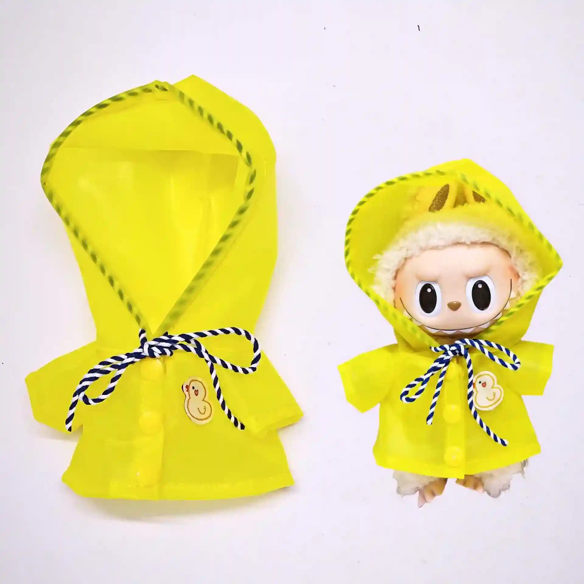 cute labubu raincoat outfit for rainy day doll photography