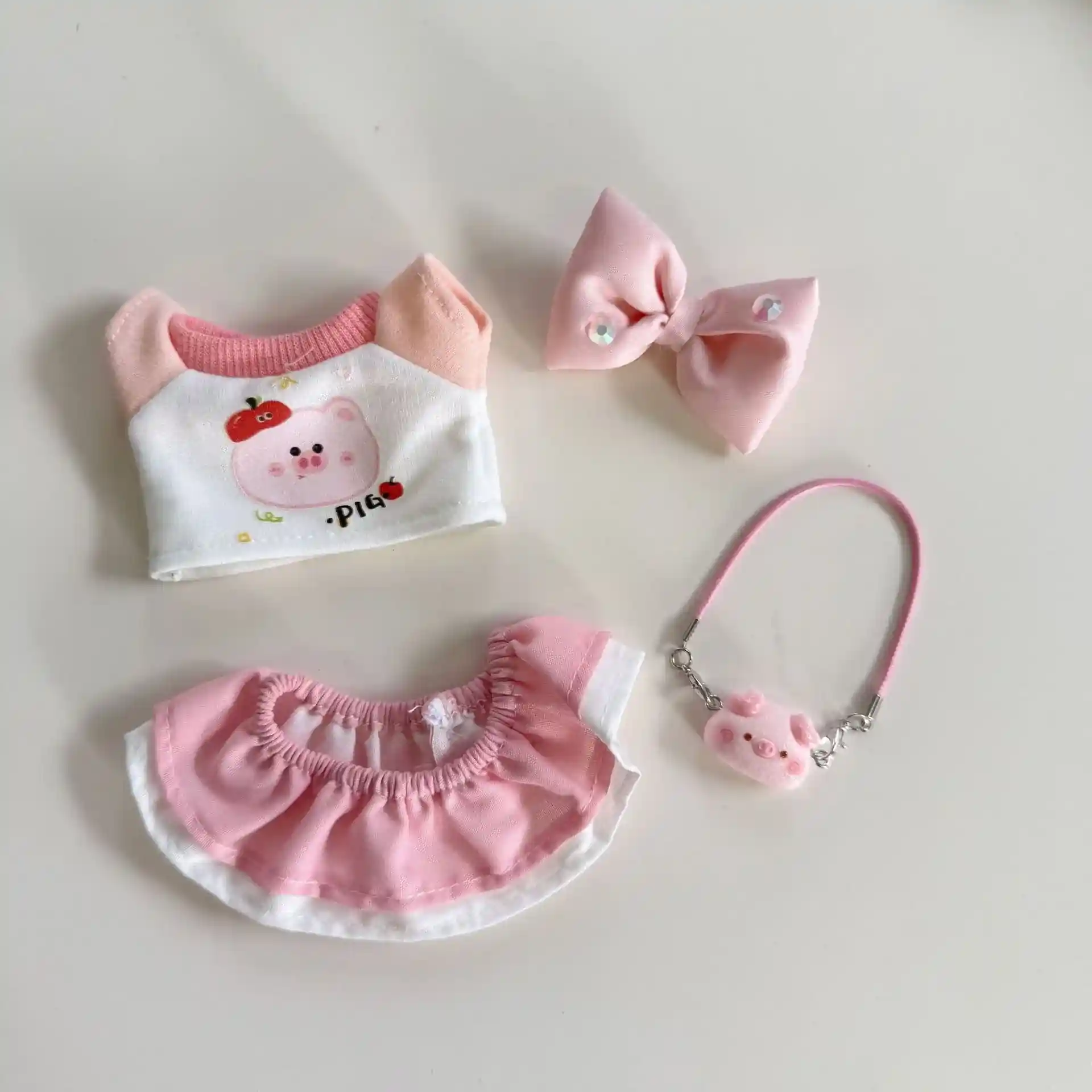 cute pastel pink labubu doll clothes with pig design