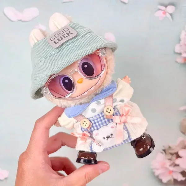 elegantly dressed labubu doll in pink floral attire