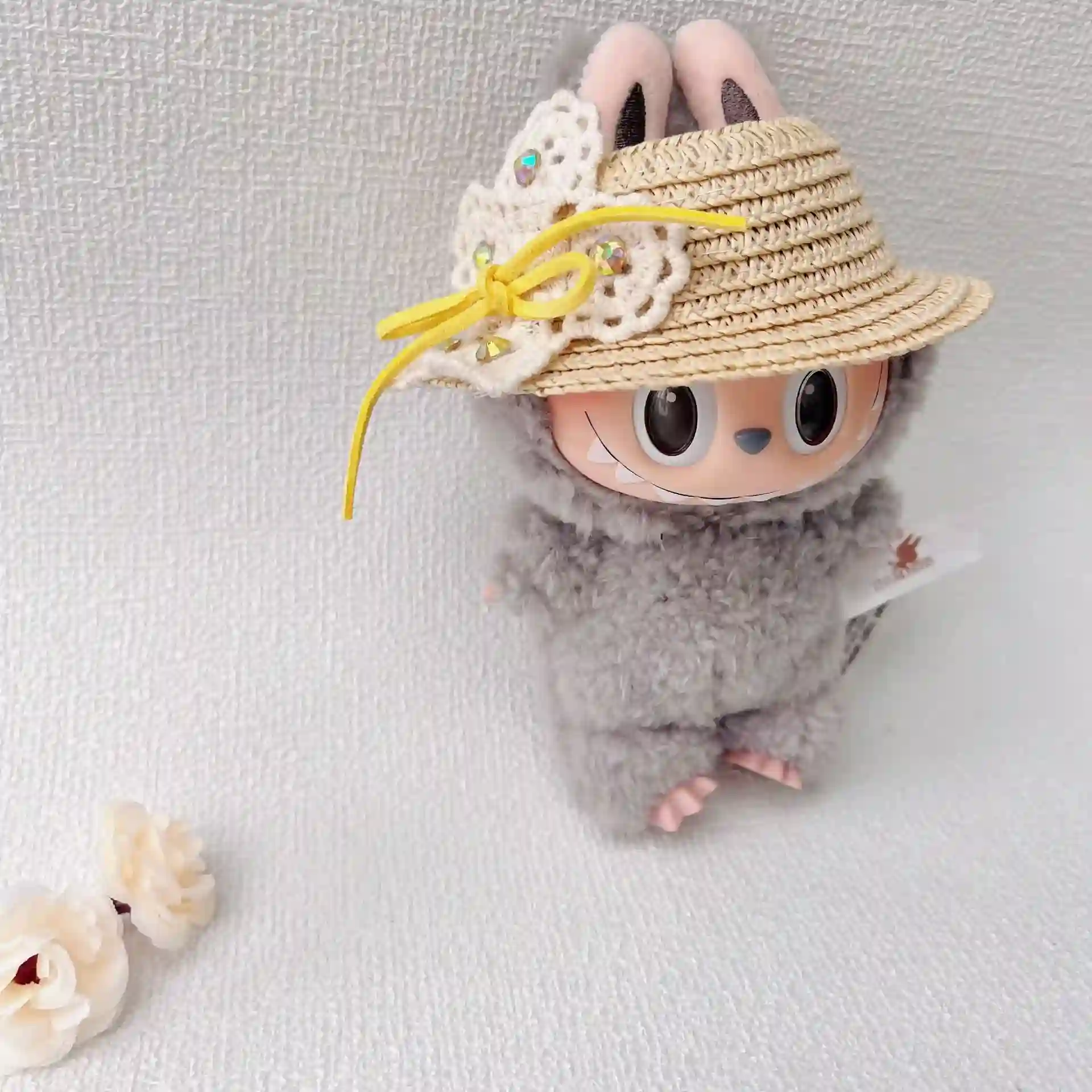 labubu doll hat with rhinestone flower accent