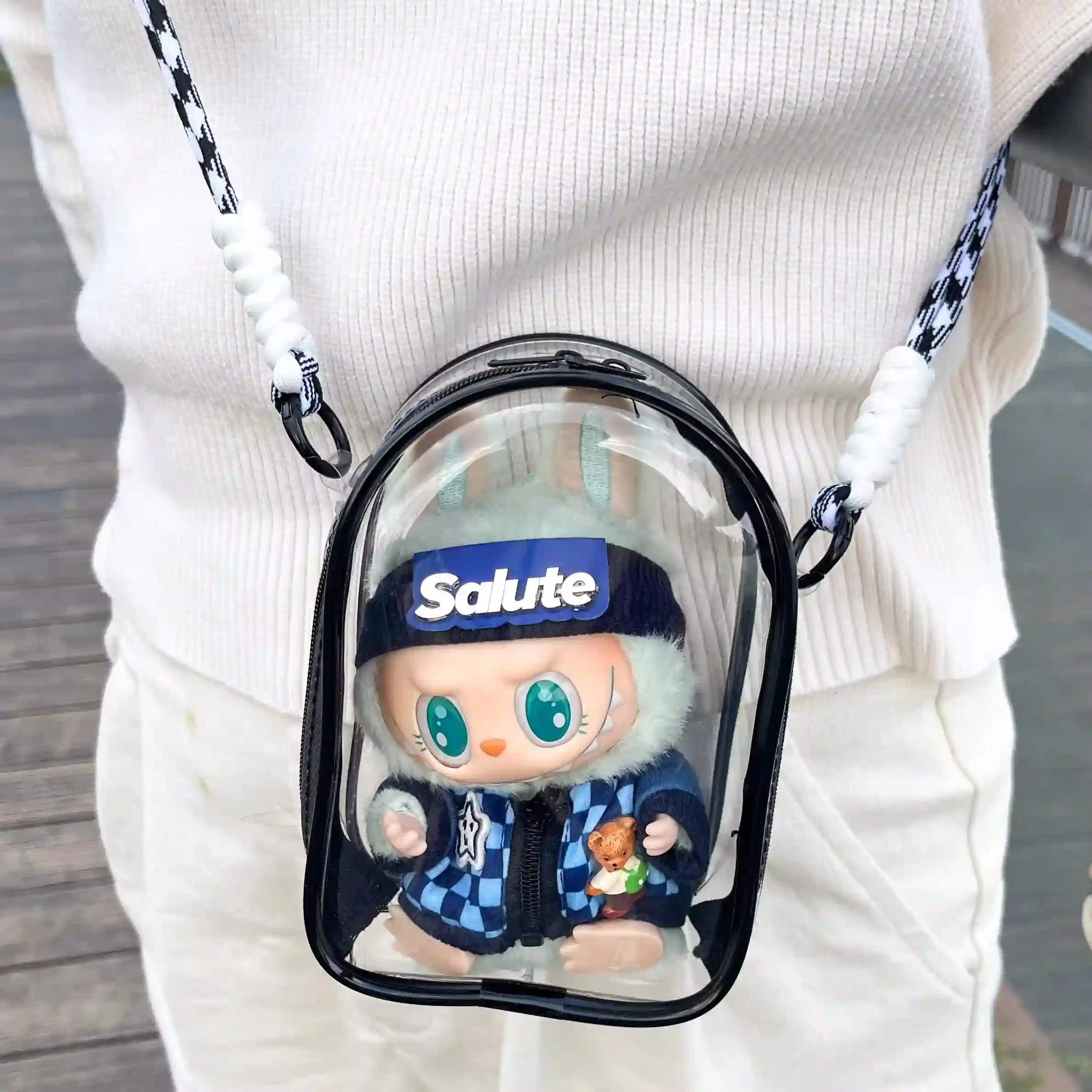 labubu doll shoulder bag with cute pastel pom pom accents
