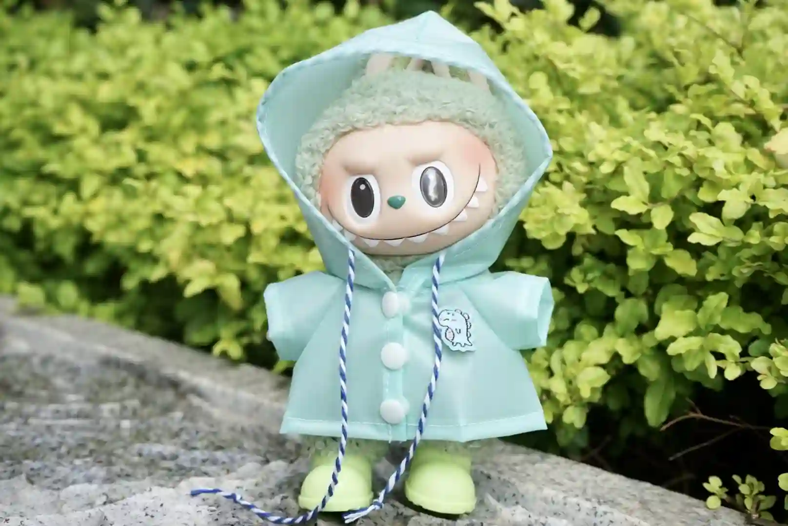 light blue labubu doll raincoat outfit with striped drawstring