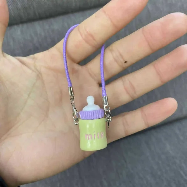 smooth polished plastic pastel milk bottle keychain labubu
