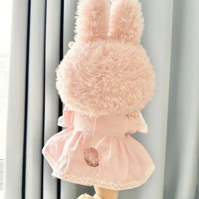 soft pink Labubu outfit with lace and ribbon details