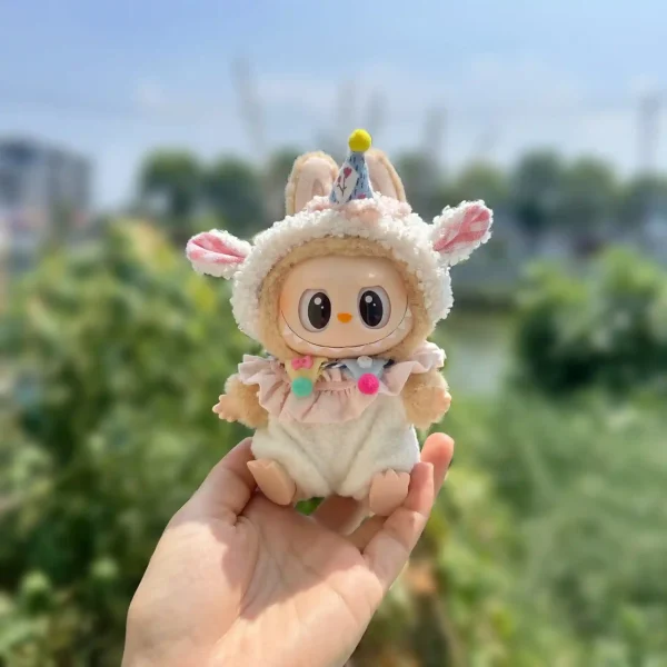 whimsical labubu lamb costume with pastel pom poms